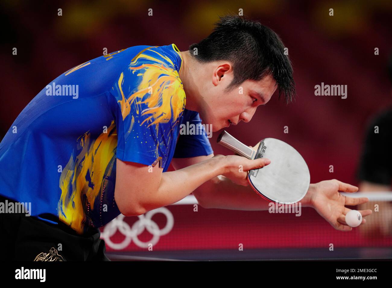 Chinas Fan Zhendong serves during the table tennis mens singles quarterfinal match against South Koreas Jeoung Young-sik at the 2020 Summer Olympics, Wednesday, July 28, 2021, in Tokyo