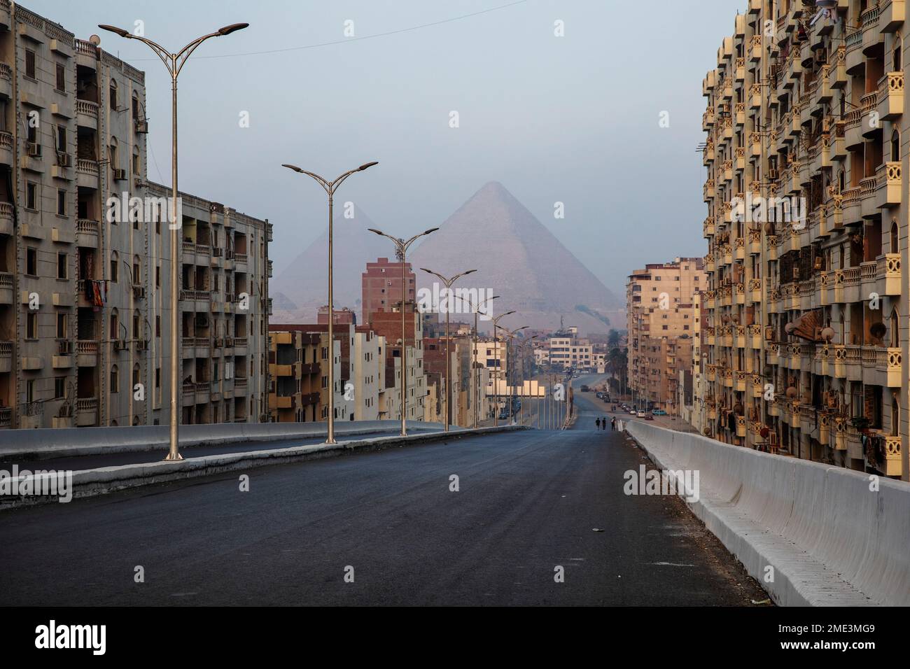 The pyramids of Giza are seen from a newly constructed bridge, part of ...