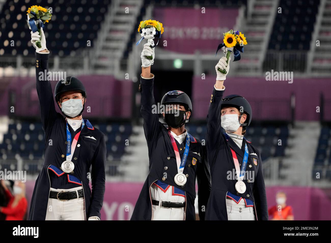 The United States' Adrienne Lyle, from left, Steffen Peters and Sabine