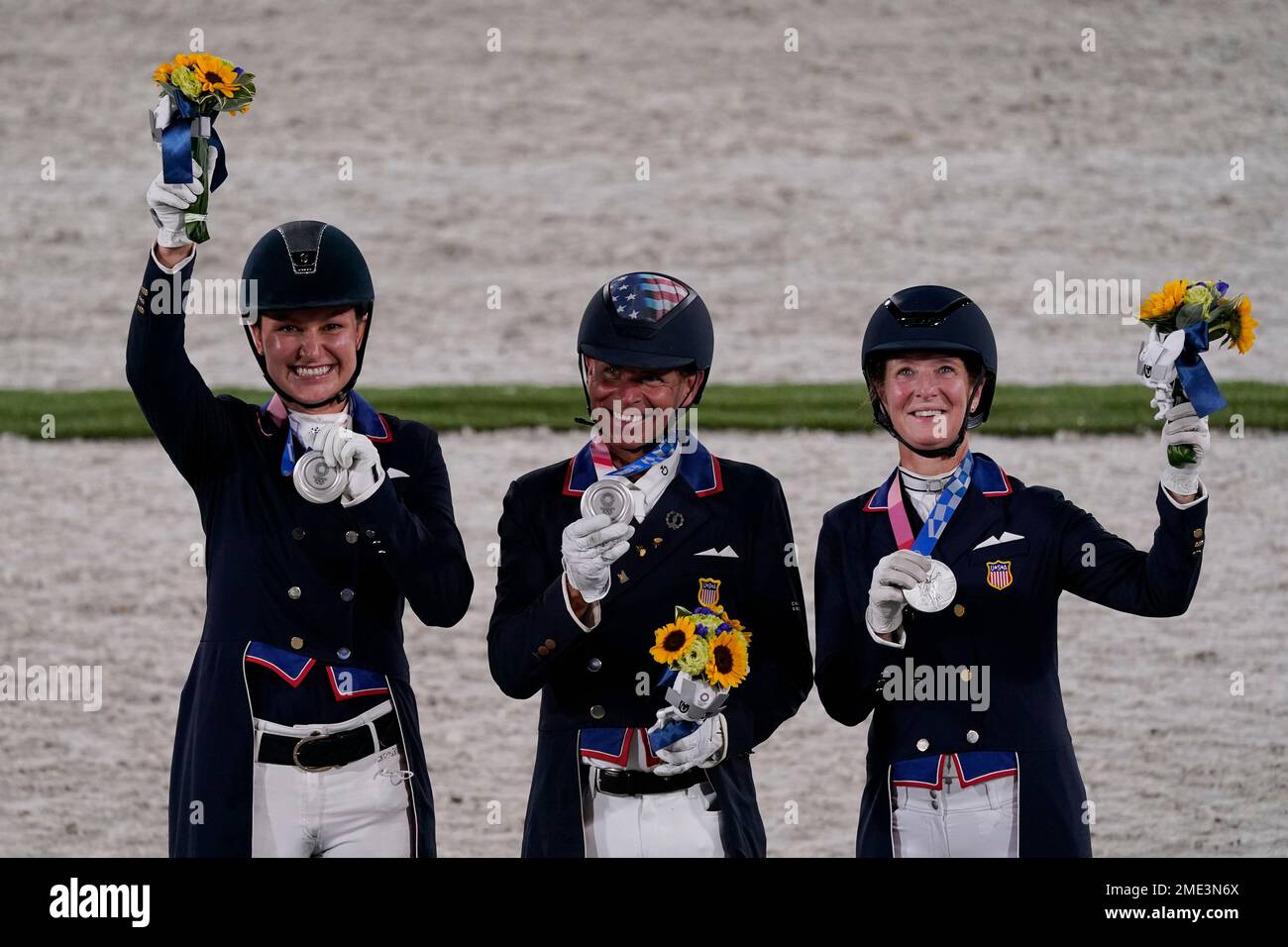 United States' Adrienne Lyle, Steffen Peters, and Sabine SchutKery