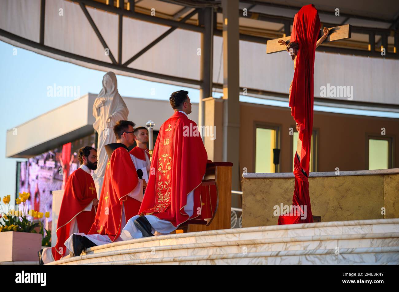 Uncovering and veneration of the Holy Cross on Good Friday in Medjugorje. Stock Photo