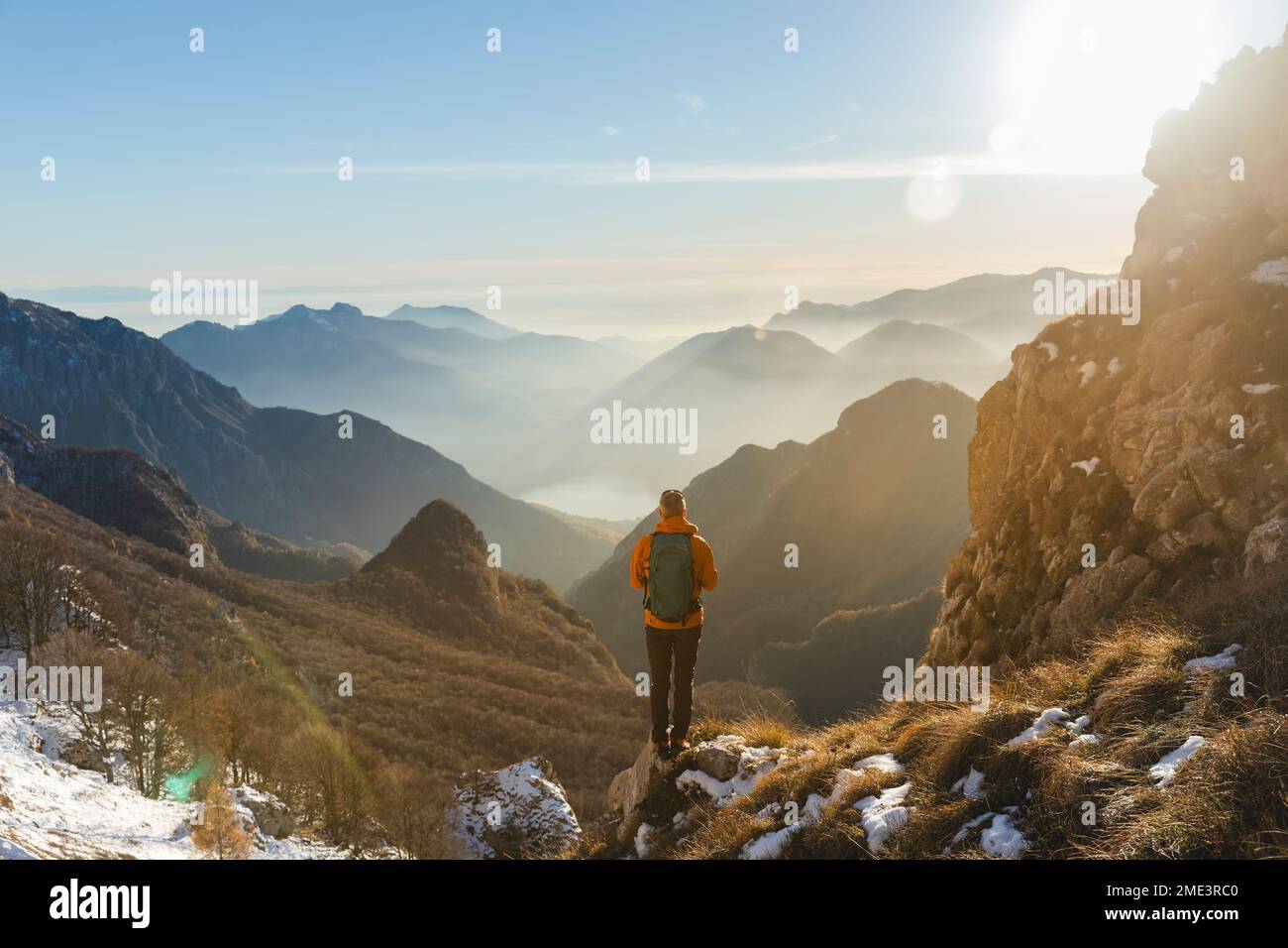Hiker standing on mountain hi-res stock photography and images - Alamy