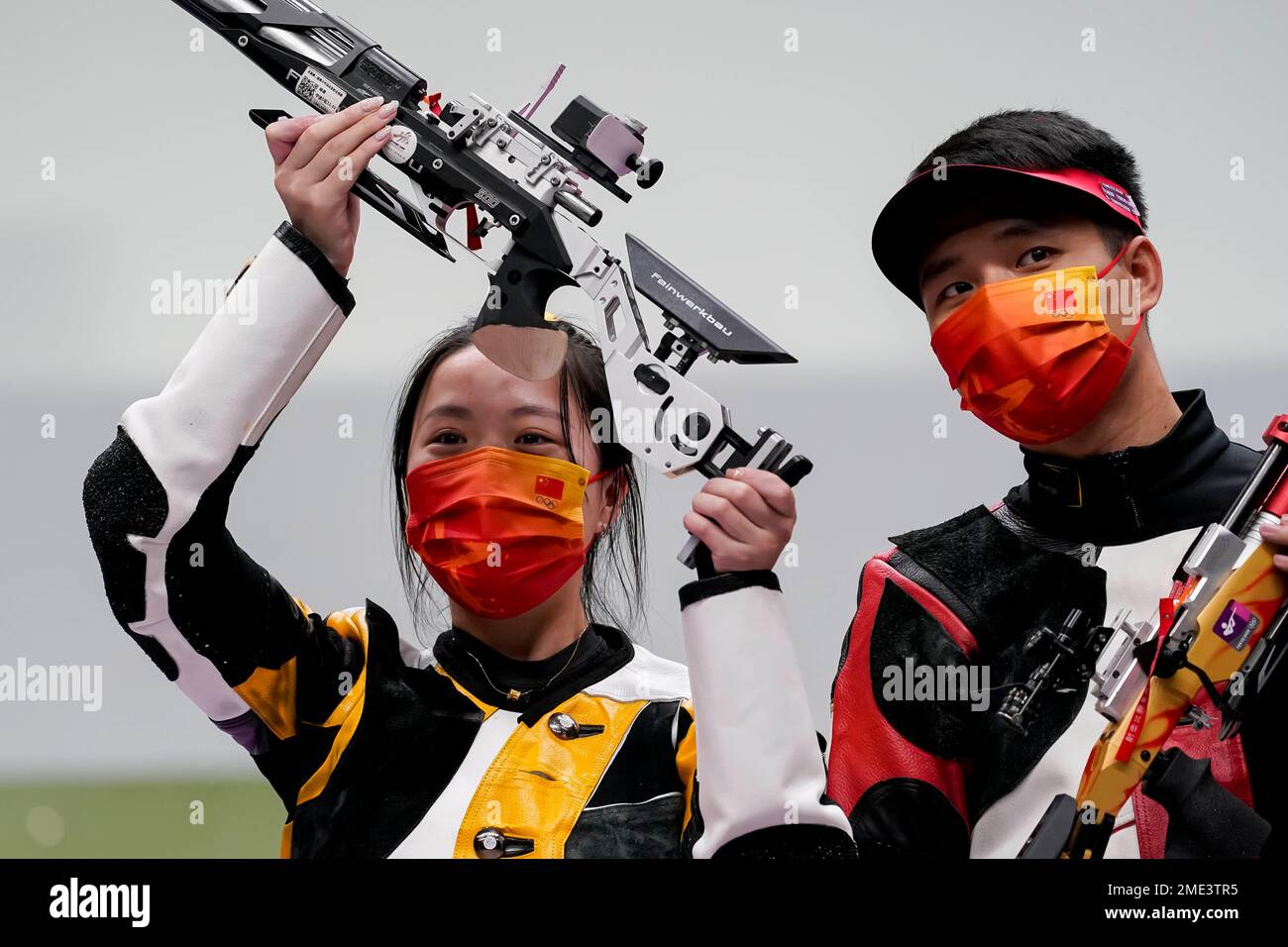 Gold medalists Yang Qian, left, and Yang Haoran, of China, celebrate