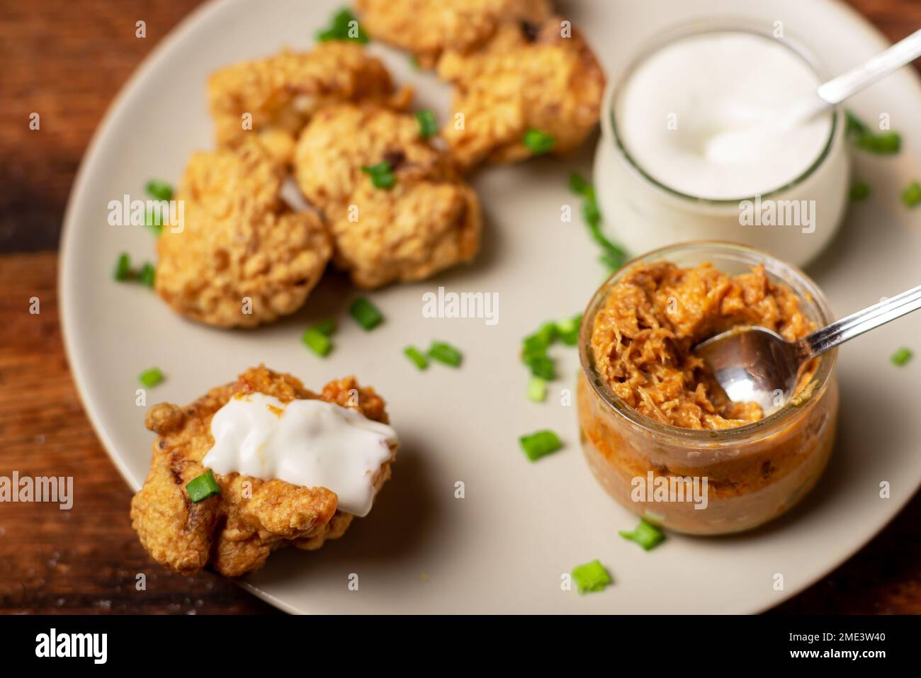 Cauliflower wings food. Pieces of flourfried cauliflower with vegan