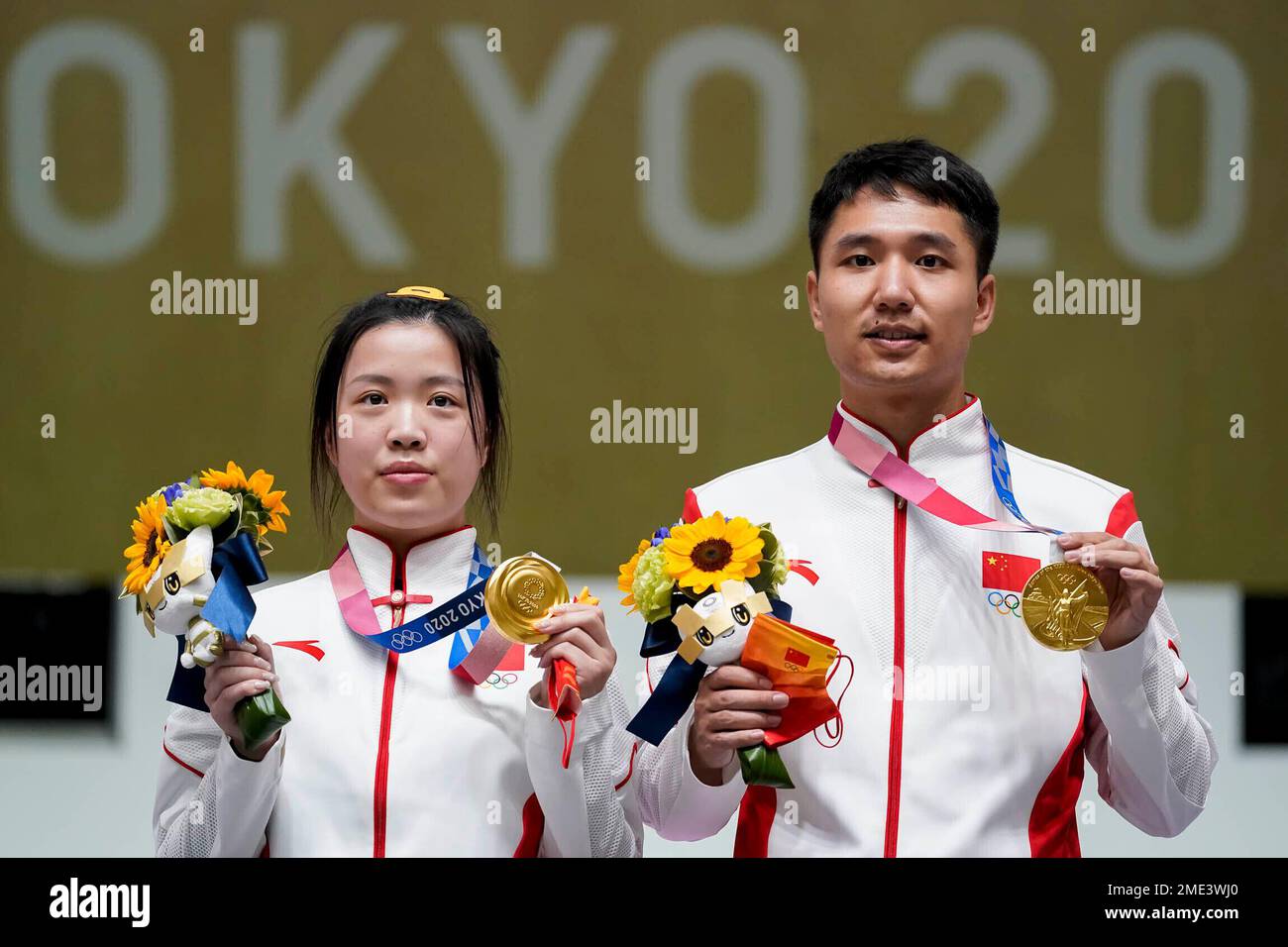 Gold medalists Yang Qian, left, and Yang Haoran, of China, celebrate