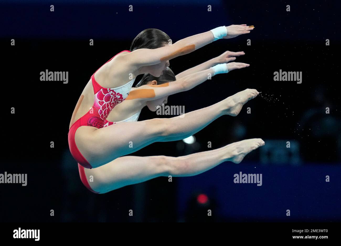 Yuxi Chen and Jiaqi Zhang of China compete during the women's ...