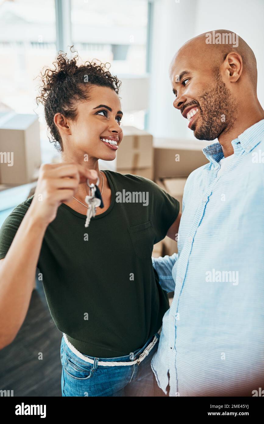 This new chapter is our best yet. a young couple holding the keys to ...