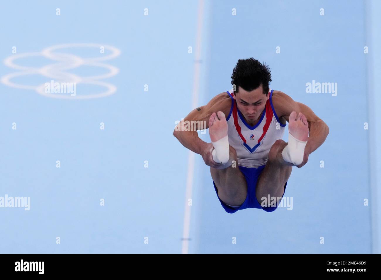 Artur Dalaloyan, of the Russian Olympic Committee, performs on the