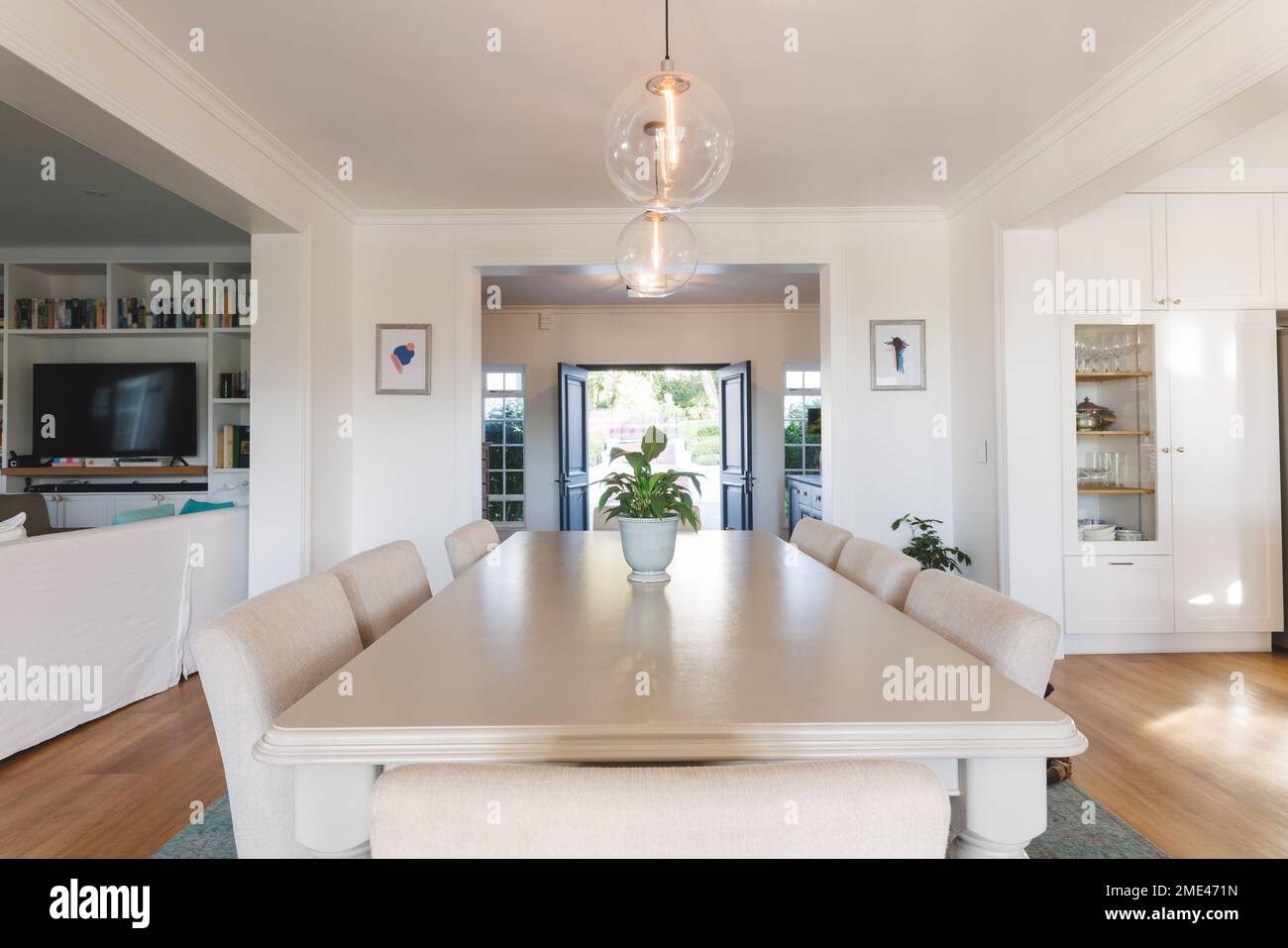 General view of luxury dining room with table and chairs Stock Photo ...