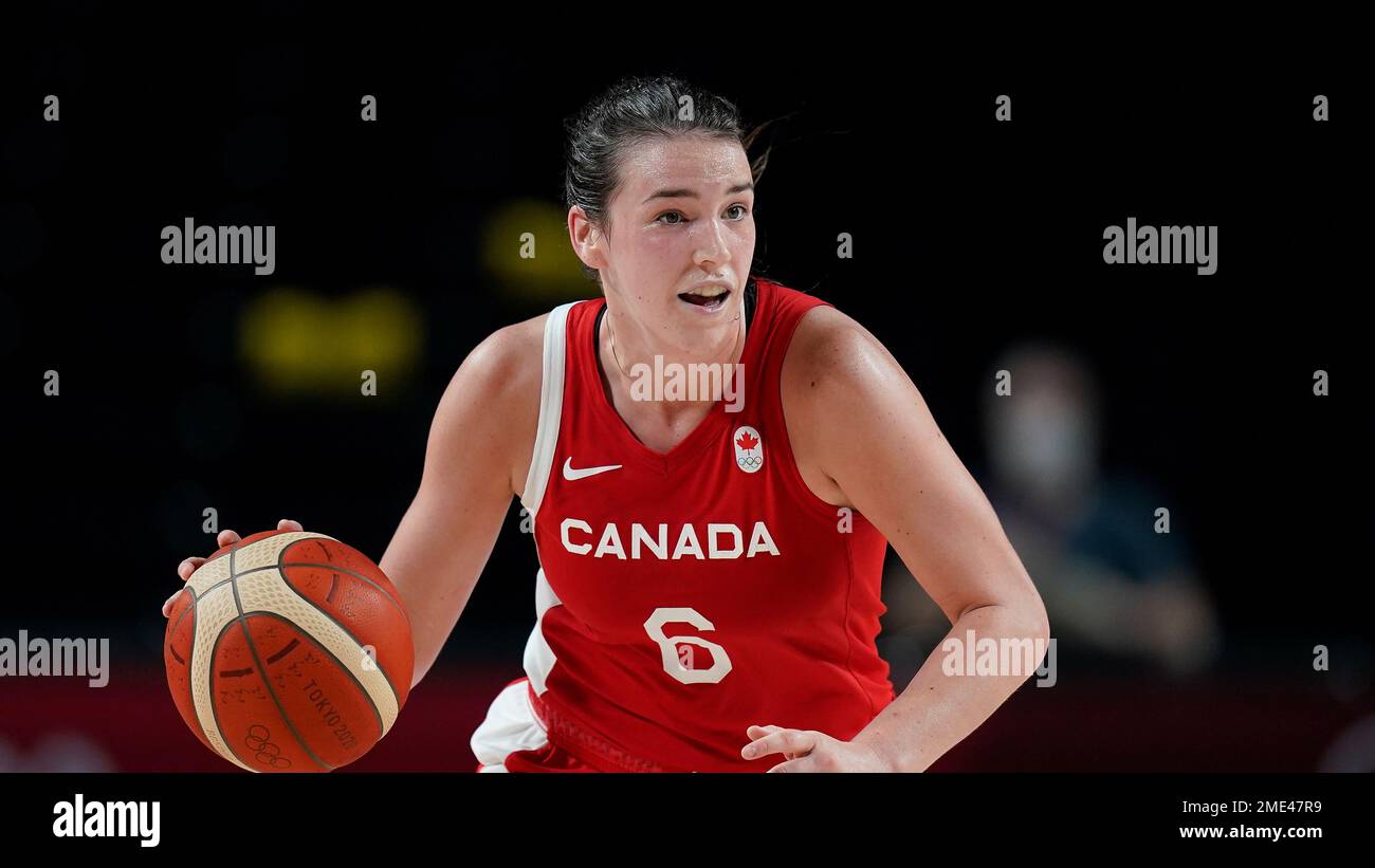 Canada s Bridget Carleton 6 drives up court during a women s