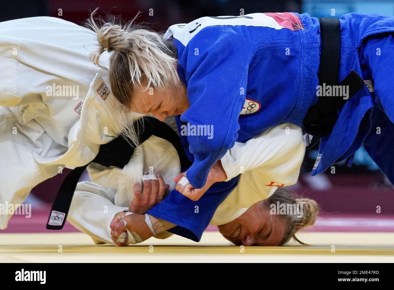 Jessica Klimkait of Canada and Kaja Kajzer of Slovenia compete during ...