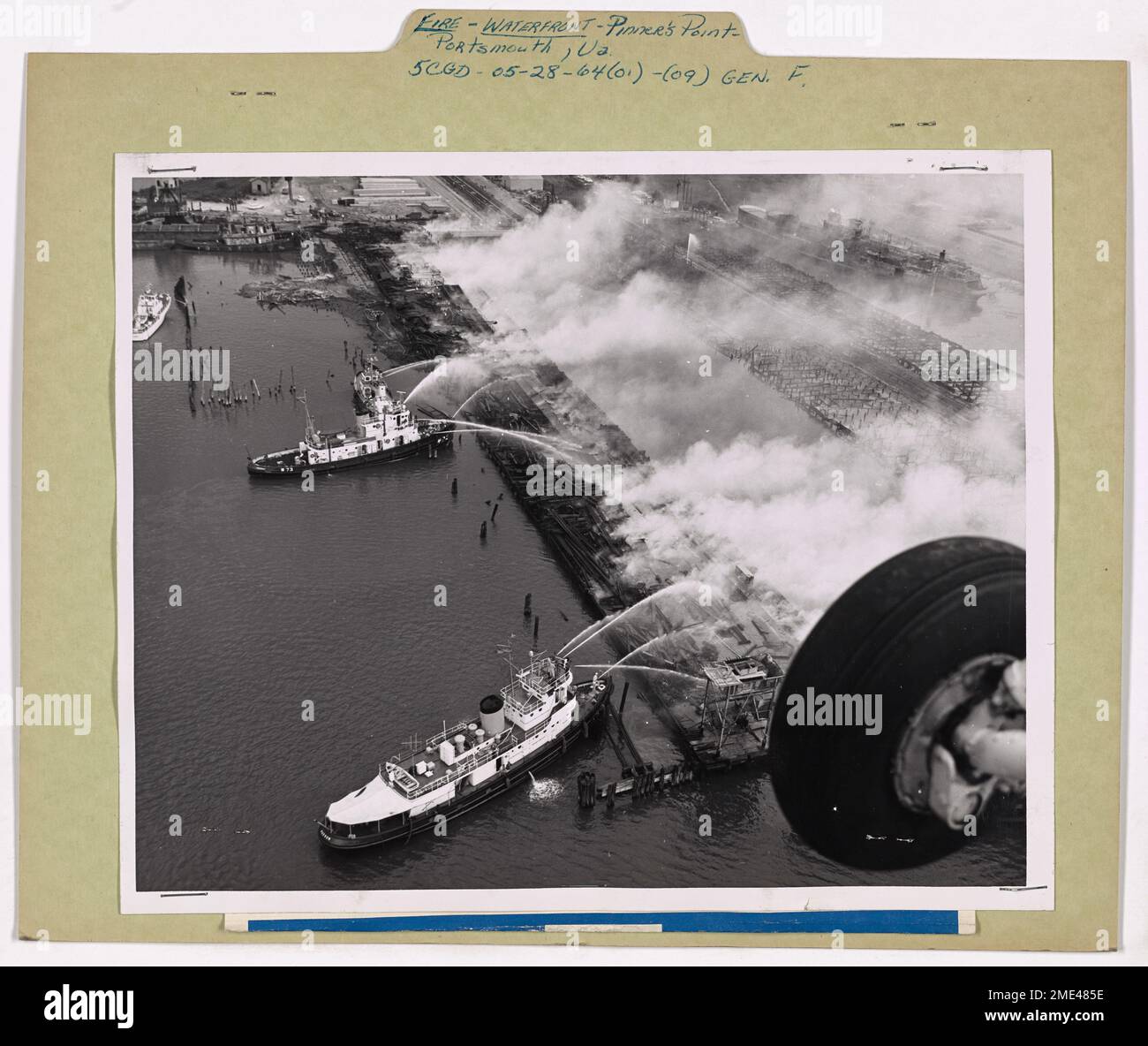 Waterfront Fire at Portsmouth, Virginia. This image depicts Coast Guard