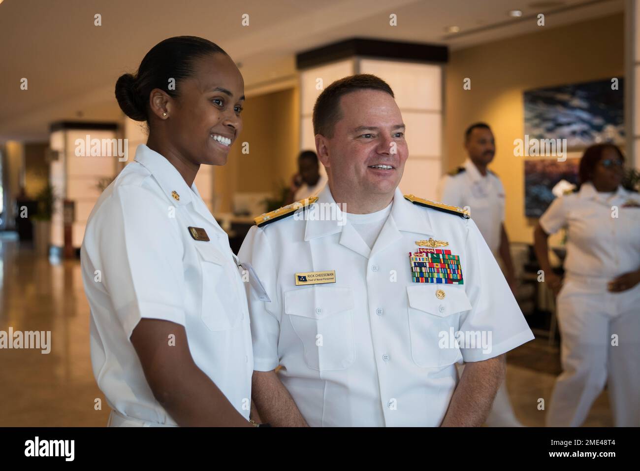 220727-N-TH560-0343 ANNAPOLIS, Md. (July 27, 2022) – Chief of Naval Personnel Vice Adm. Rick Cheeseman poses for a photo with a Sailor at the National Naval Officers Association (NNOA) 50th Year Symposium, July 27, 2022. The annual NNOA conference aims to increase attendees’ overall awareness of issues affecting the sea service while hosting educational and professional development workshops, seminars, and exhibits. Stock Photo