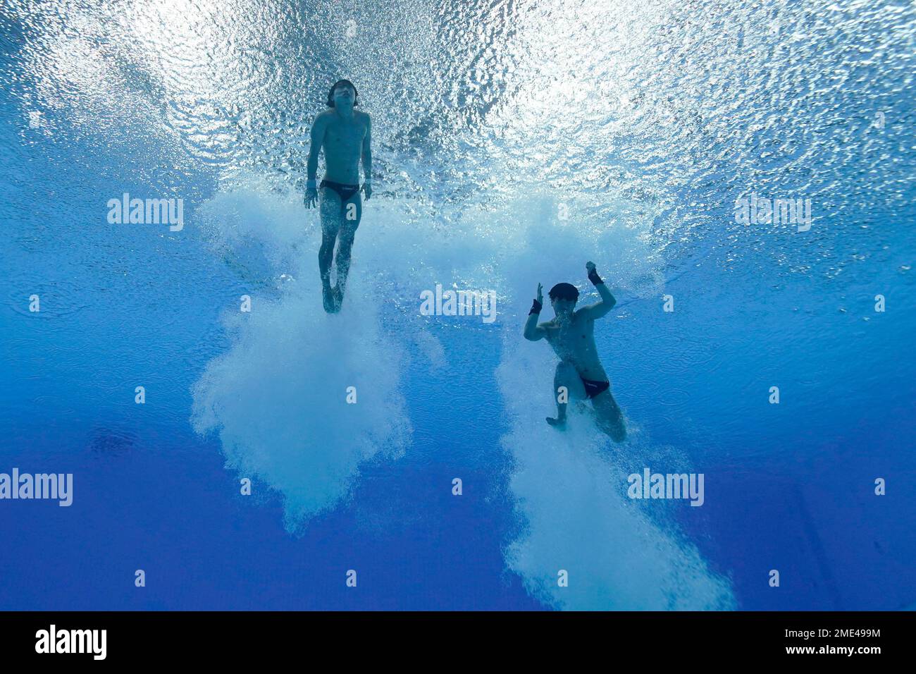 South Korea's Kim Yeognam and Woo Haram compete in the synchronized 10-meter  platform diving final at the 2020 Summer Olympics, Monday, July 26, 2021,  in Tokyo. (AP Photo/David J. Phillip Stock Photo - Alamy