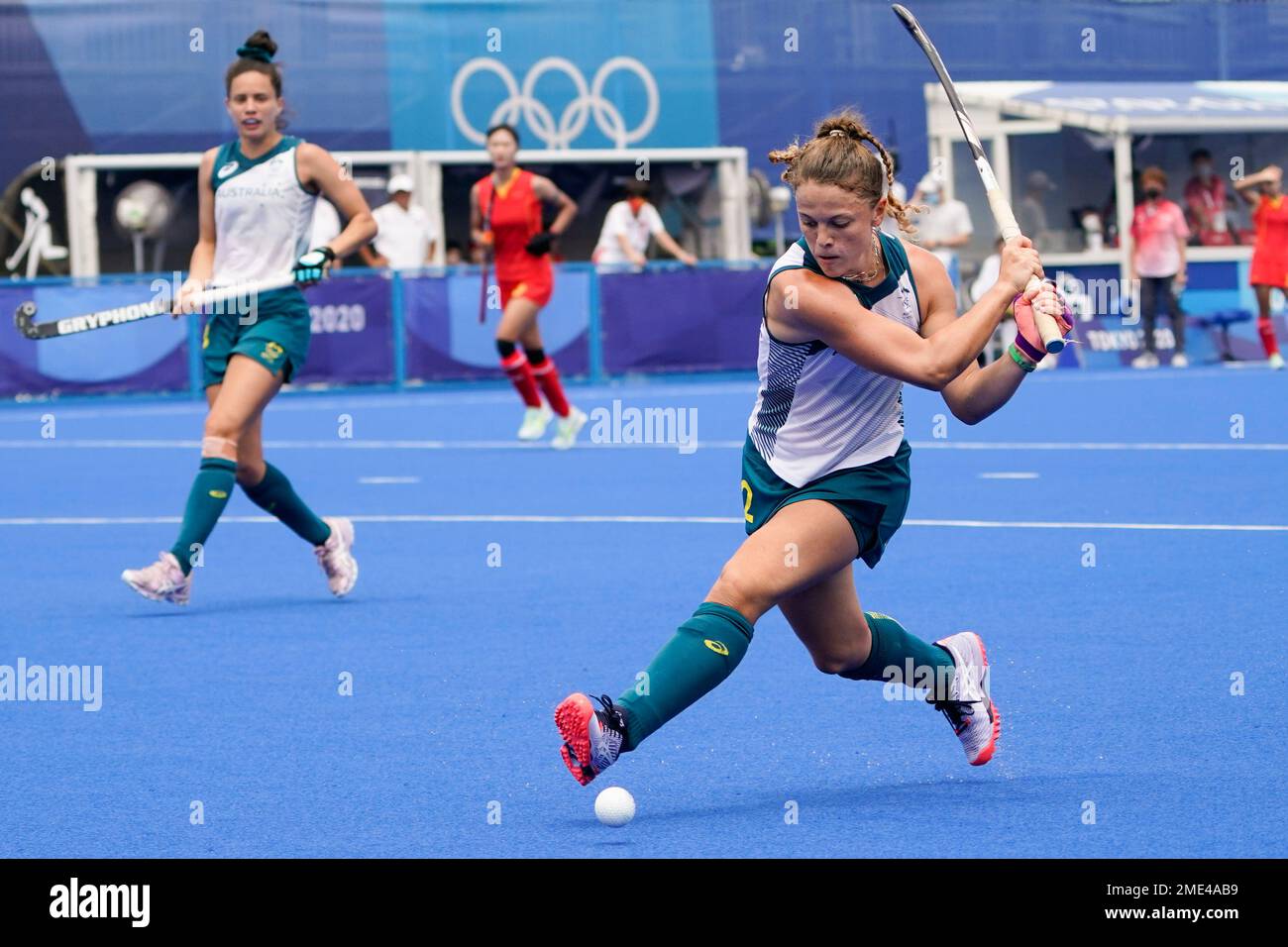 Australia's Ambrosia Malone scores on China goalkeeper Dongxiao Li ...