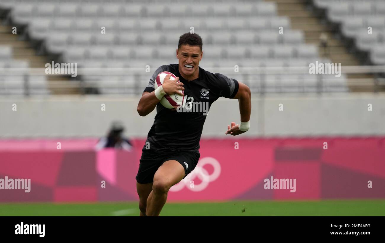 Bricked Rugby William Warbrick of New Zealand runs with a ball against South Korea ...