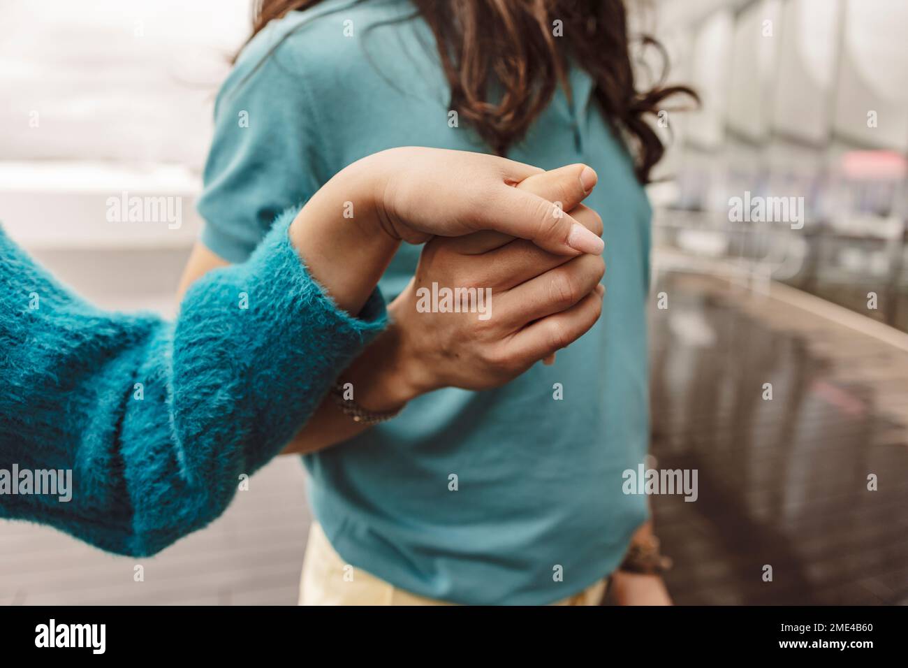 Women holding hands at protest Stock Photo