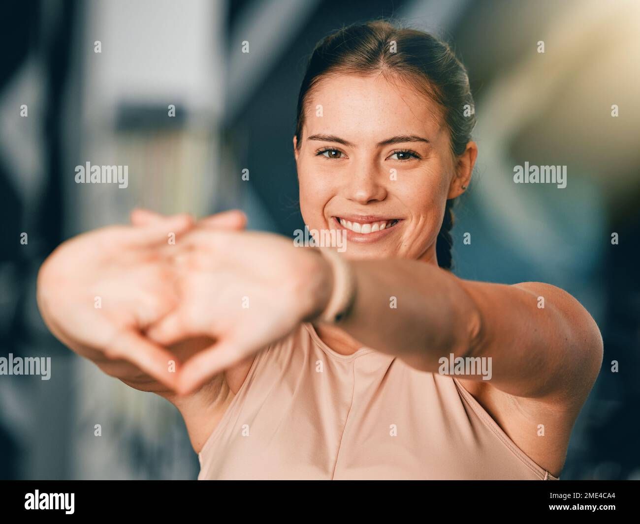 Portrait, exercise and woman stretching arms, training and fitness for wellness, energy and power. Female athlete, trainer and lady stretch, happiness Stock Photo