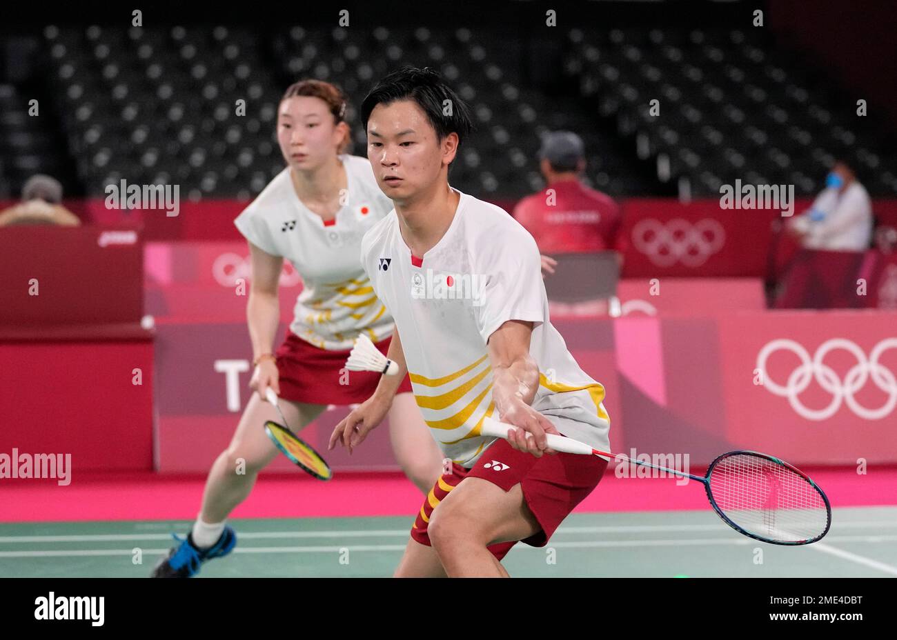 Japan's Yuta Watanabe and Arisa Higashino play against Indonesia's Praveen  Jordan and Melati Daeva Oktavianti during their mixed doubles group play  stage badminton match at the 2020 Summer Olympics, Monday, July 26,