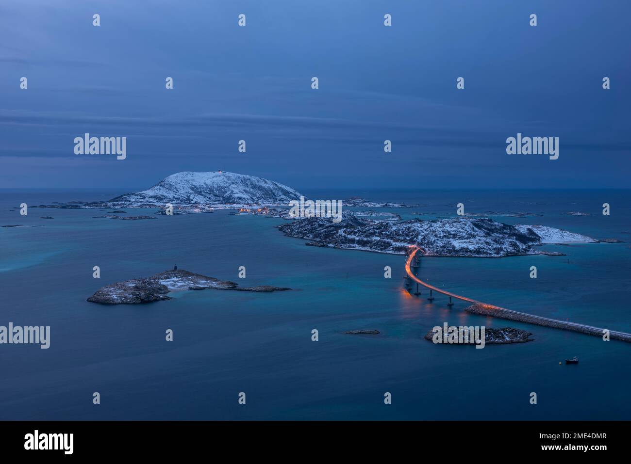 Norway, Troms og Finnmark, Tromso, Aerial view of Sommaroy Bridge at dusk Stock Photo