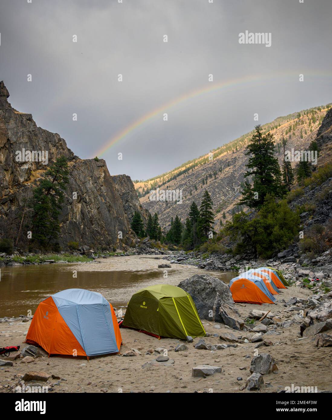 Rainbow over campsite on the Middle Fork Salmon River, Idaho. Stock Photo