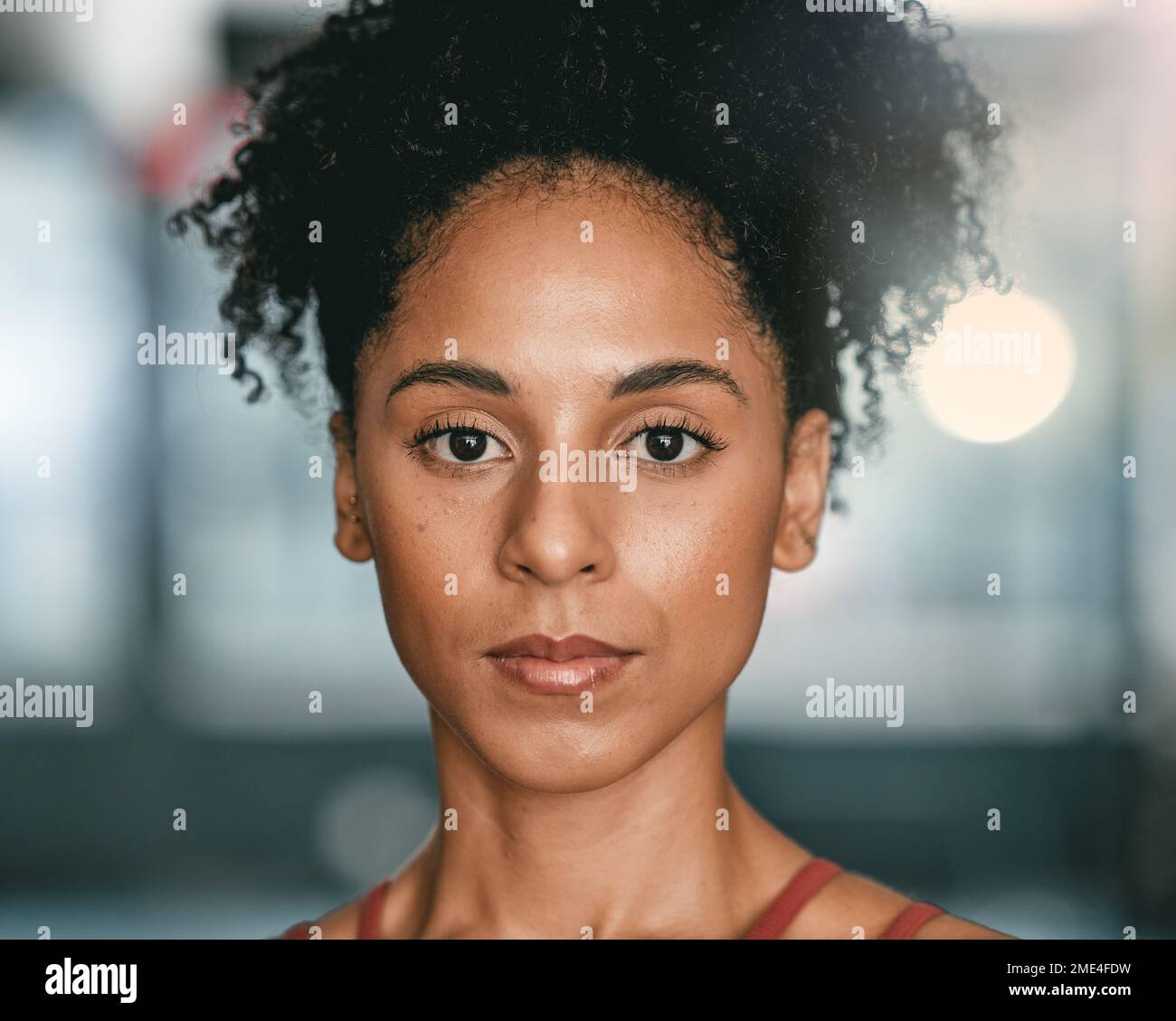 Portrait, black woman and serious for workout, training and endurance ...