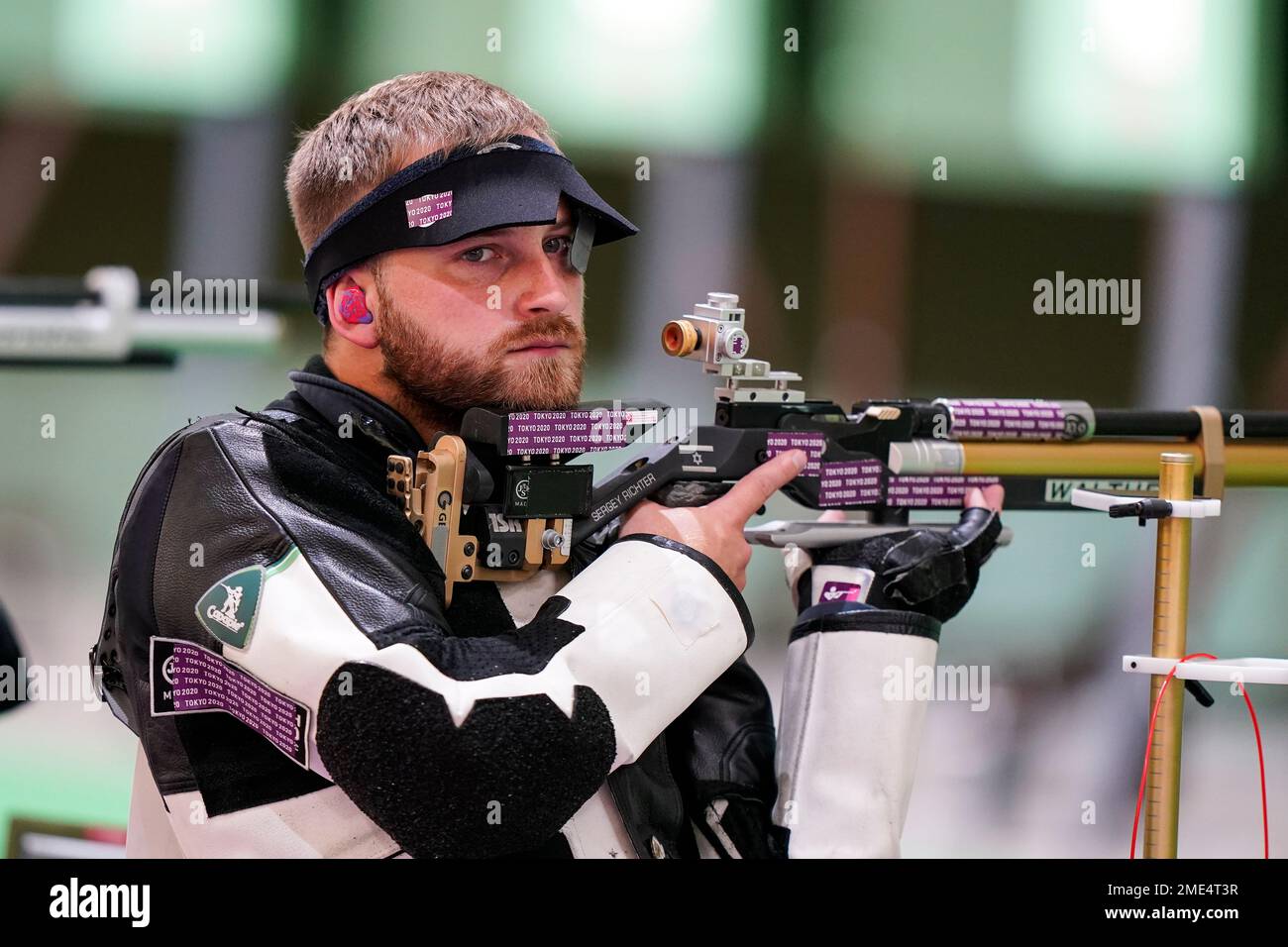 Sergey Richter, of Israel, competes in the men's 10-meter air rifle at ...