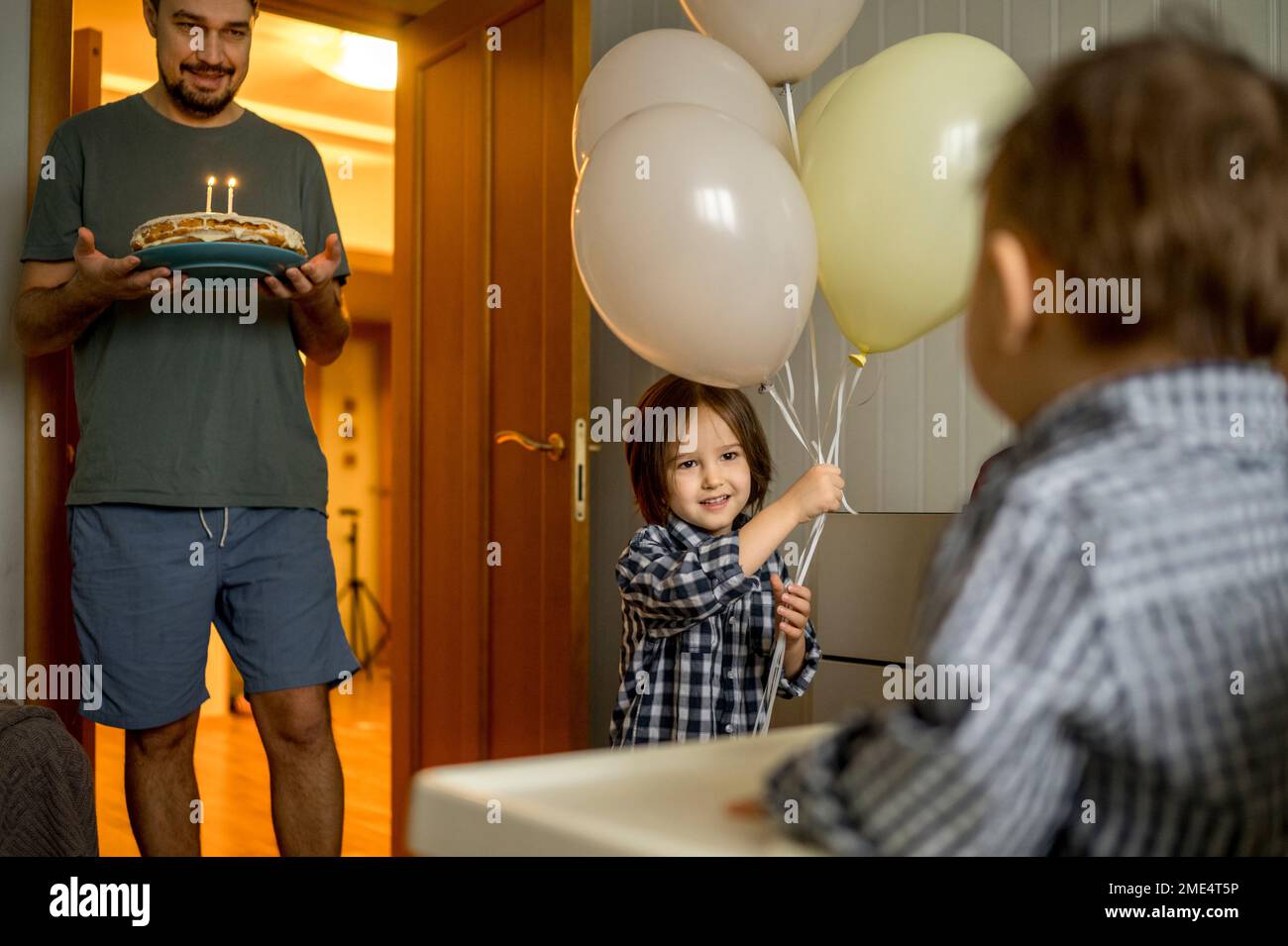 Happy Family Celebrating Boy s Birthday At Home Stock Photo Alamy happy-family-celebrating-boy-s-birthday-at-home-stock-photo-alamy