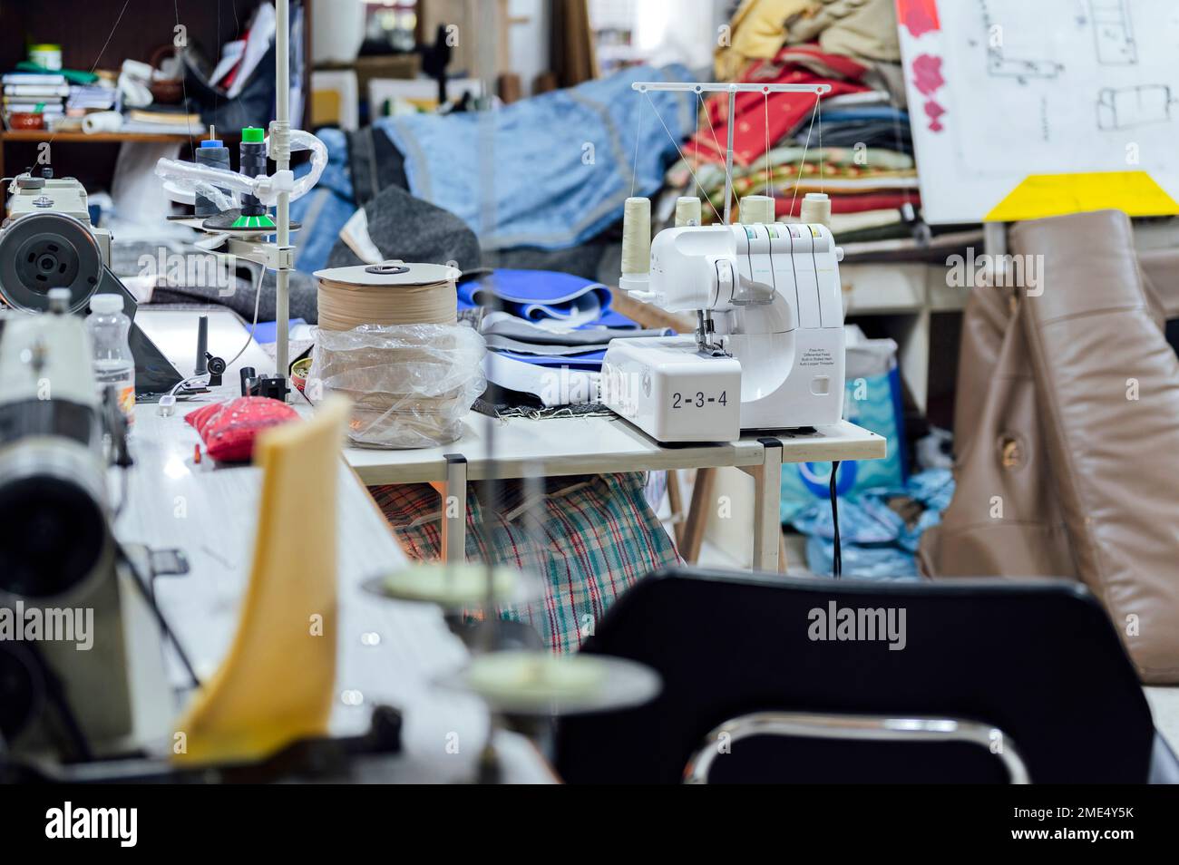 Work tools and machinery on table in workshop Stock Photo