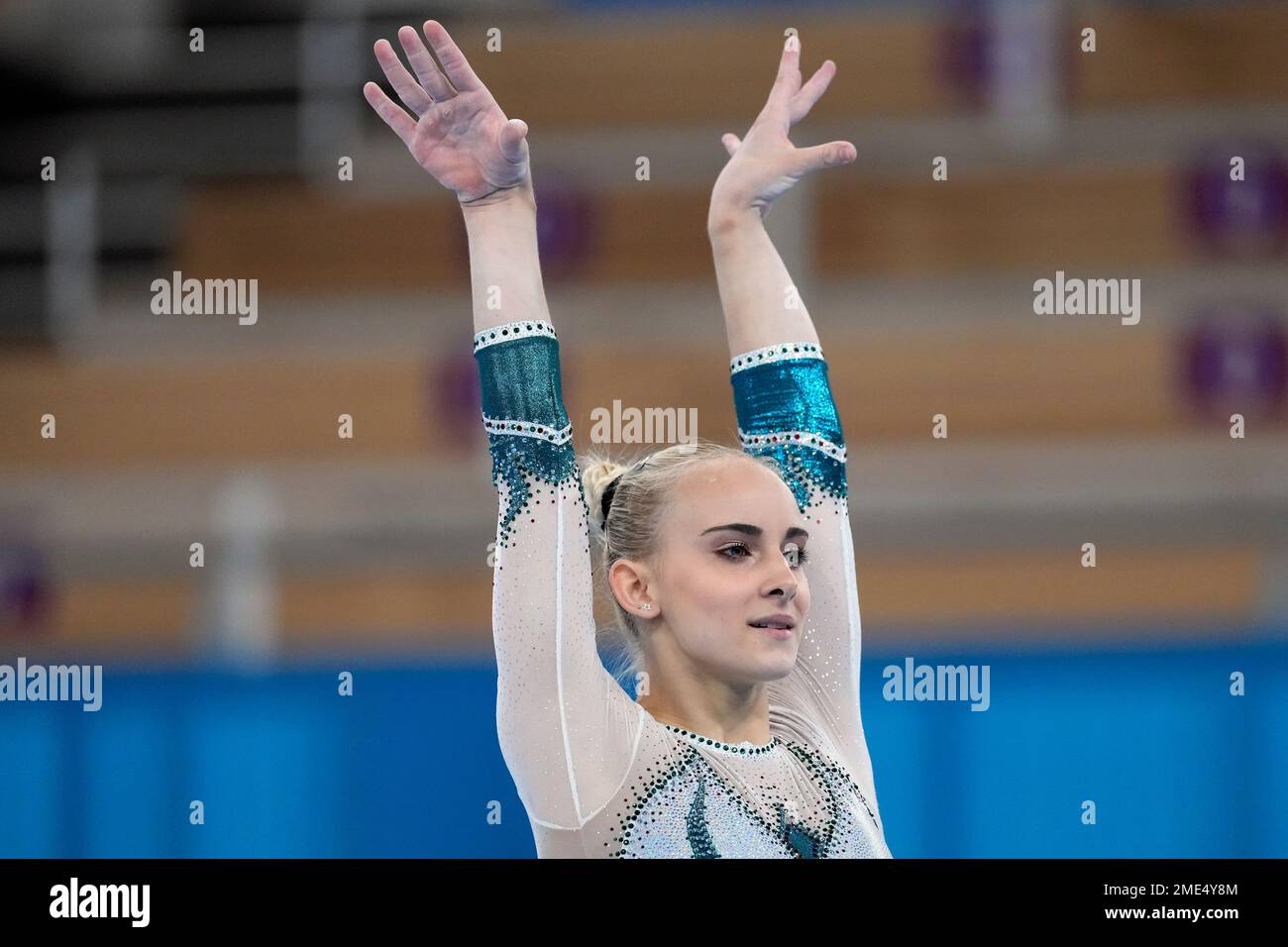 Alice D'Amato, of Italy, performs on the balance beam during the women
