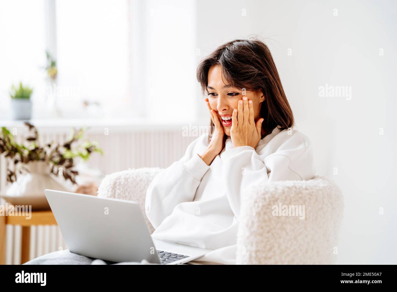 Surprised woman on white hi-res stock photography and images - Alamy