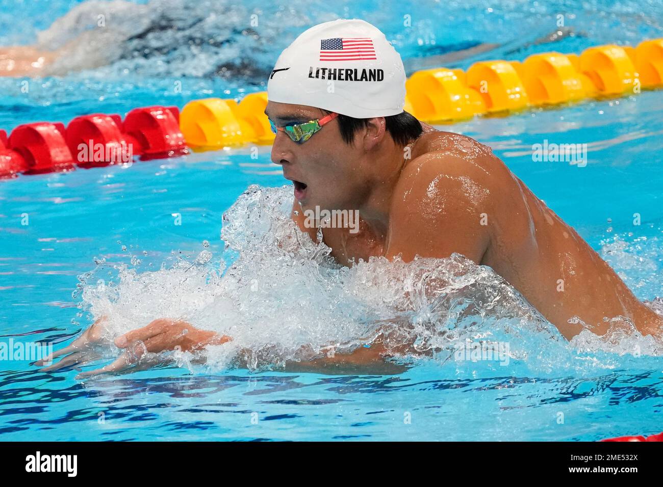 Jay Litherland, of the United States, swims during a heat for the men's