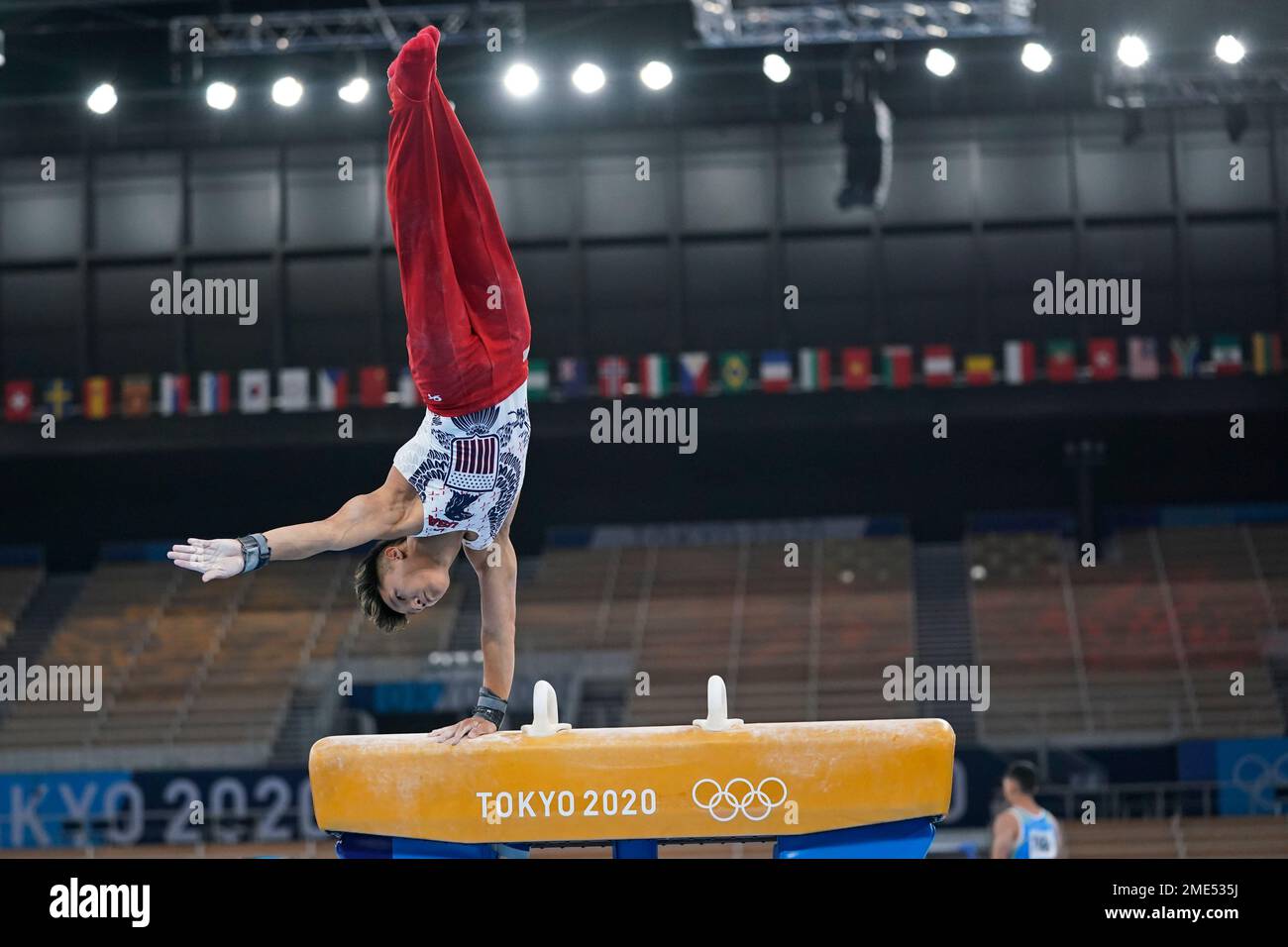 Yul Moldauer, of the United States, performs on the pommel horse during