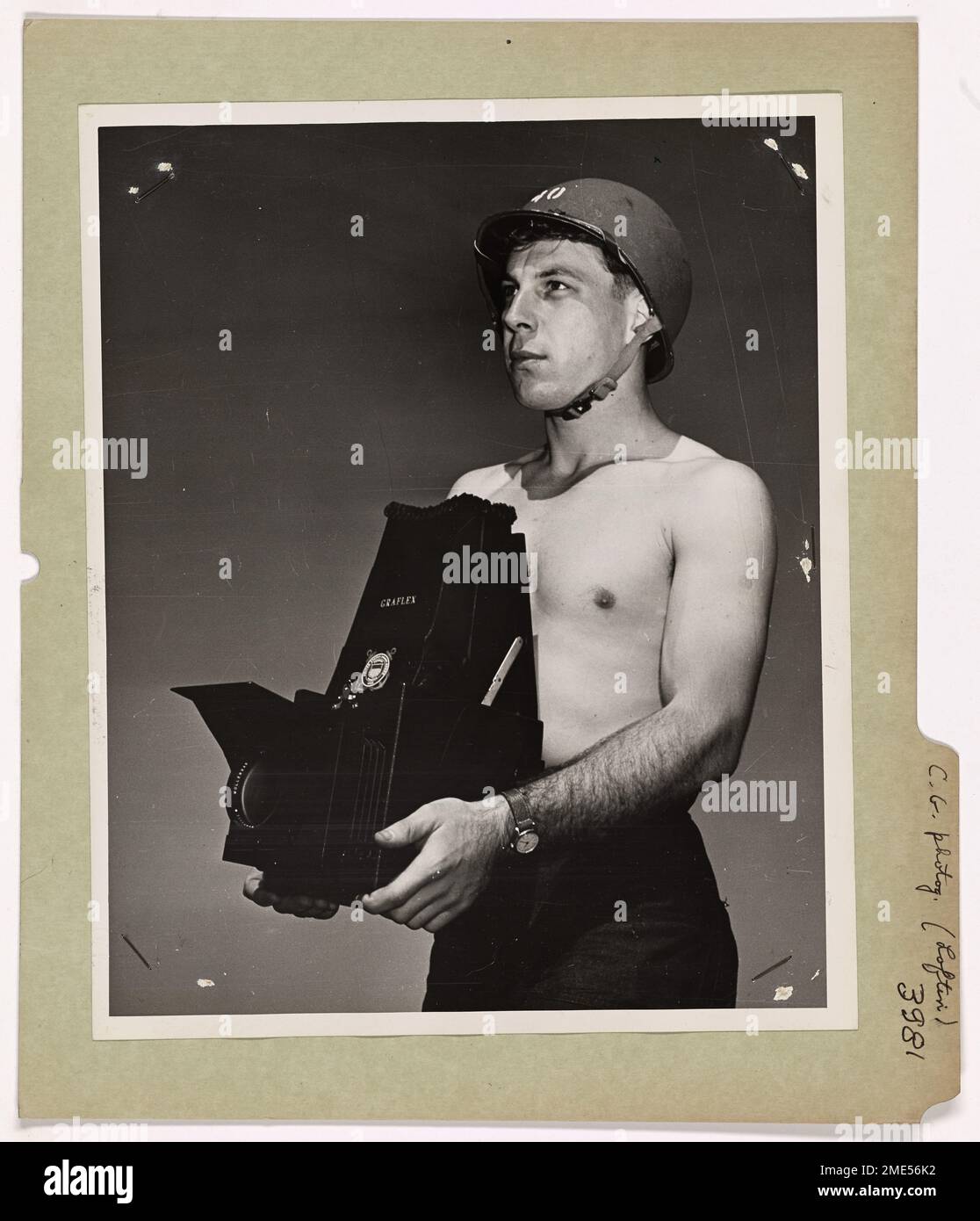 Coast Guard Combat Photog in Pacific. Coast Guardsman Max A. Loftin, of