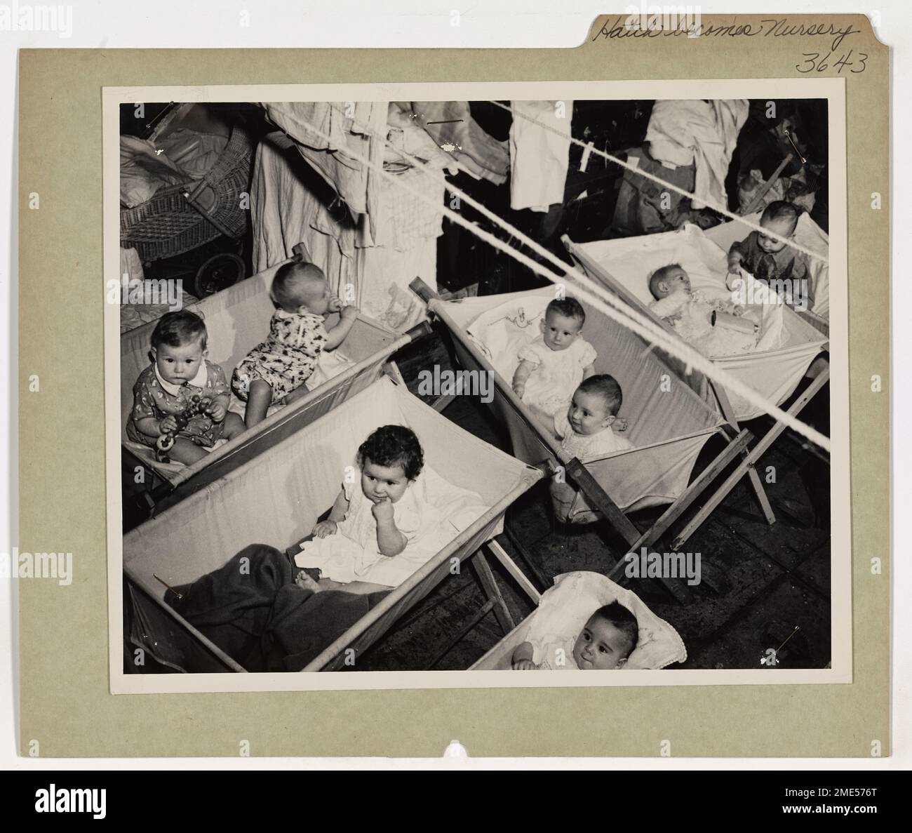A Ship's Hatch a Nursery. Aboard a Coast Guardmanned troop