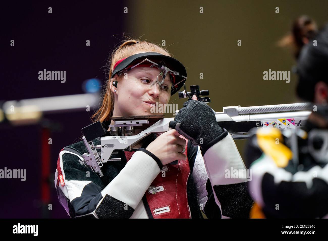 Nina Christen, of Switzerland, reacts after a shot as she competes in ...