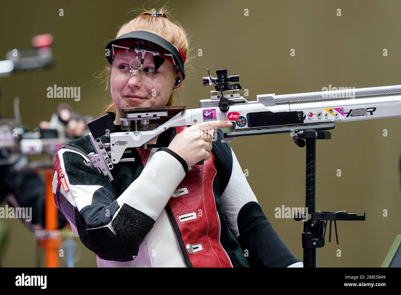 Nina Christen, of Switzerland, reacts after a shot as she competes in ...