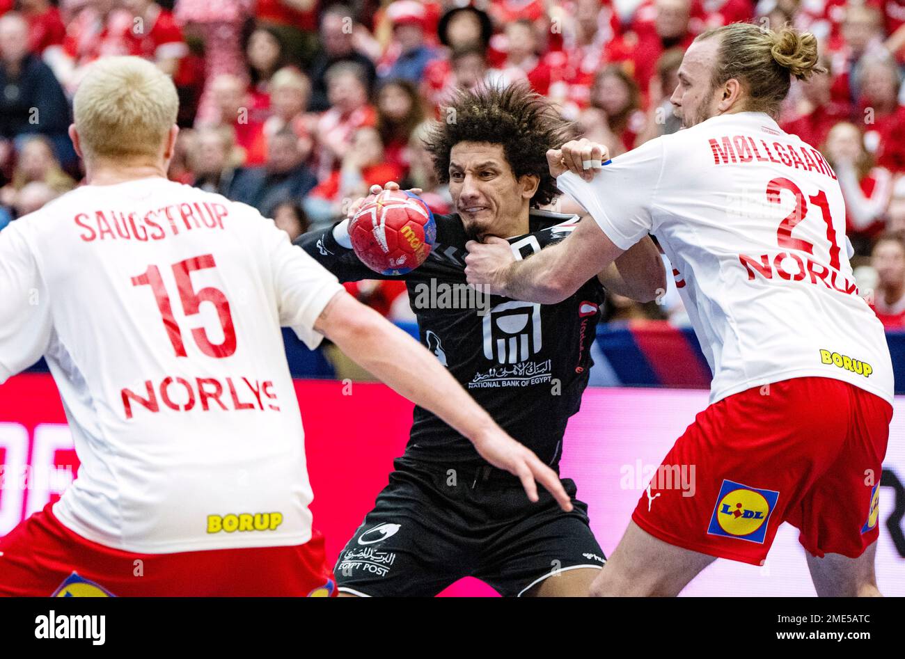 MALMÖ 20230123 Egypt's Ali Mohamed (90) between Denmark's Magnus