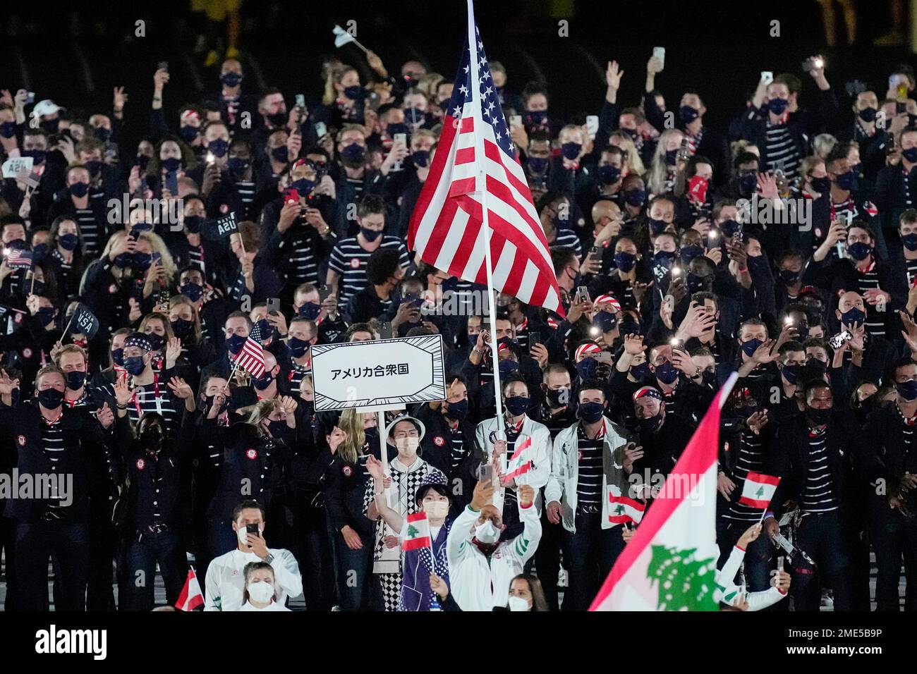 Athletes from the United States of America walk during the opening ...