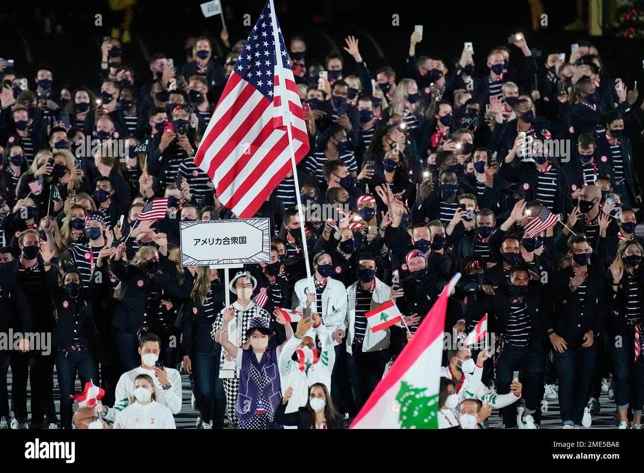 Athletes from the United States of America walk during the opening ...