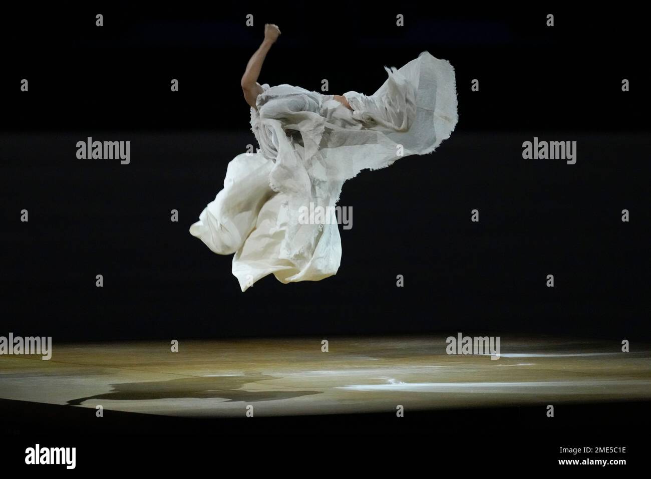 A dancer performs during the opening ceremony in the Olympic Stadium at ...