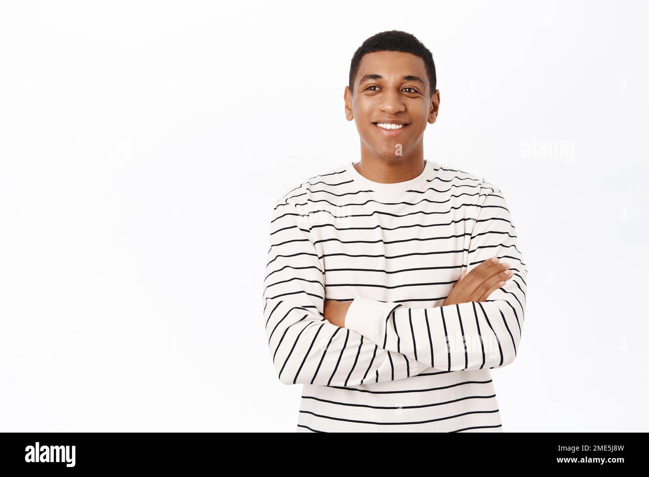 Adult black man cross arms on chest, smiling and looking happy ...