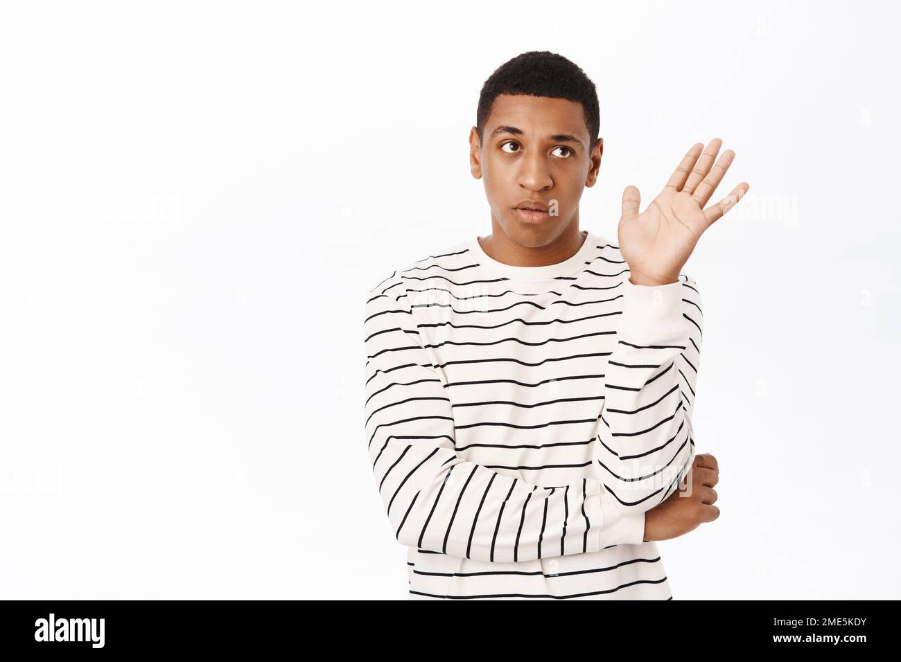 Annoyed african american man shows stop, taboo gesture, reject smth and