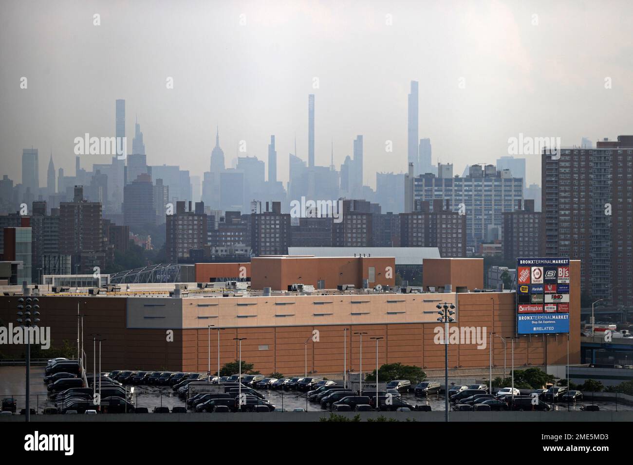Manhattan is seen from Yankee Stadium through a haze of smoke before a  baseball game between the Philadelphia Phillies and the New York Yankees,  Wednesday, July 21, 2021, in New York. Wildfires