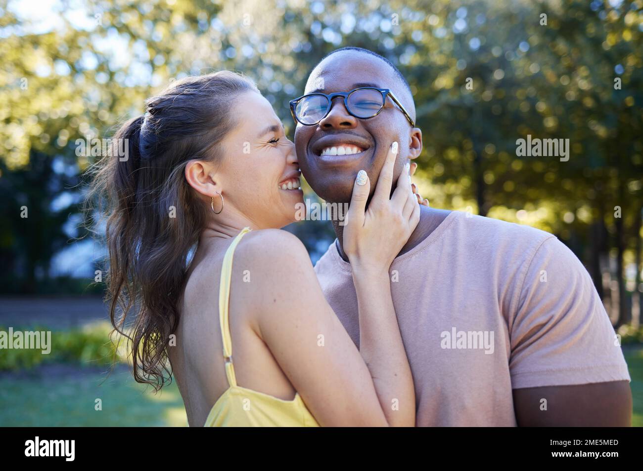 Summer, love and laugh with an interracial couple bonding outdoor together  in a park or garden. Nature, diversity and romance with a man and woman  Stock Photo - Alamy