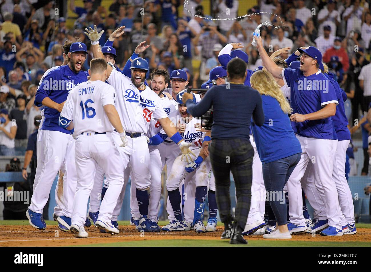 Los Angeles Dodgers' celebrate in the ninth inning after Will Smith hit a  solo home run to give the Dodgers their second walk-off win in four days  with a 4-3 victory over