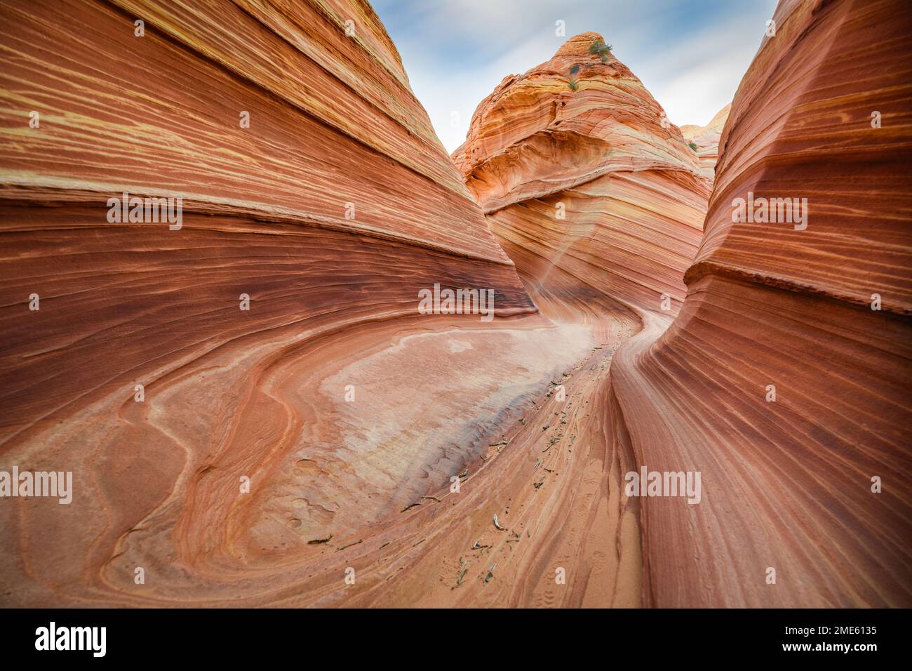 Walking Through a Corridor of Swirl and Texture at The Wave in Vermillion Cliffs National Monument in Arizona Stock Photo