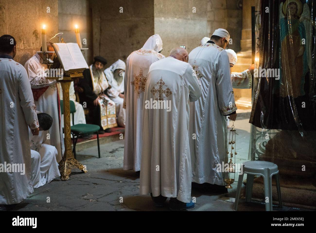 Pilgrims and tourists in the Church of the Holy Sepulchre in the Old Jerusalem, Israel, Middle east, Asia. Stock Photo
