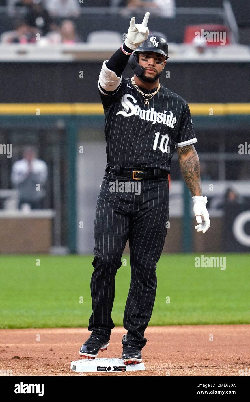 Chicago White Sox's Yoan Moncada gestures after hitting an RBI double  during the first inning of the team's baseball game against the Houston  Astros in Chicago, Friday, July 16, 2021. (AP Photo/Nam