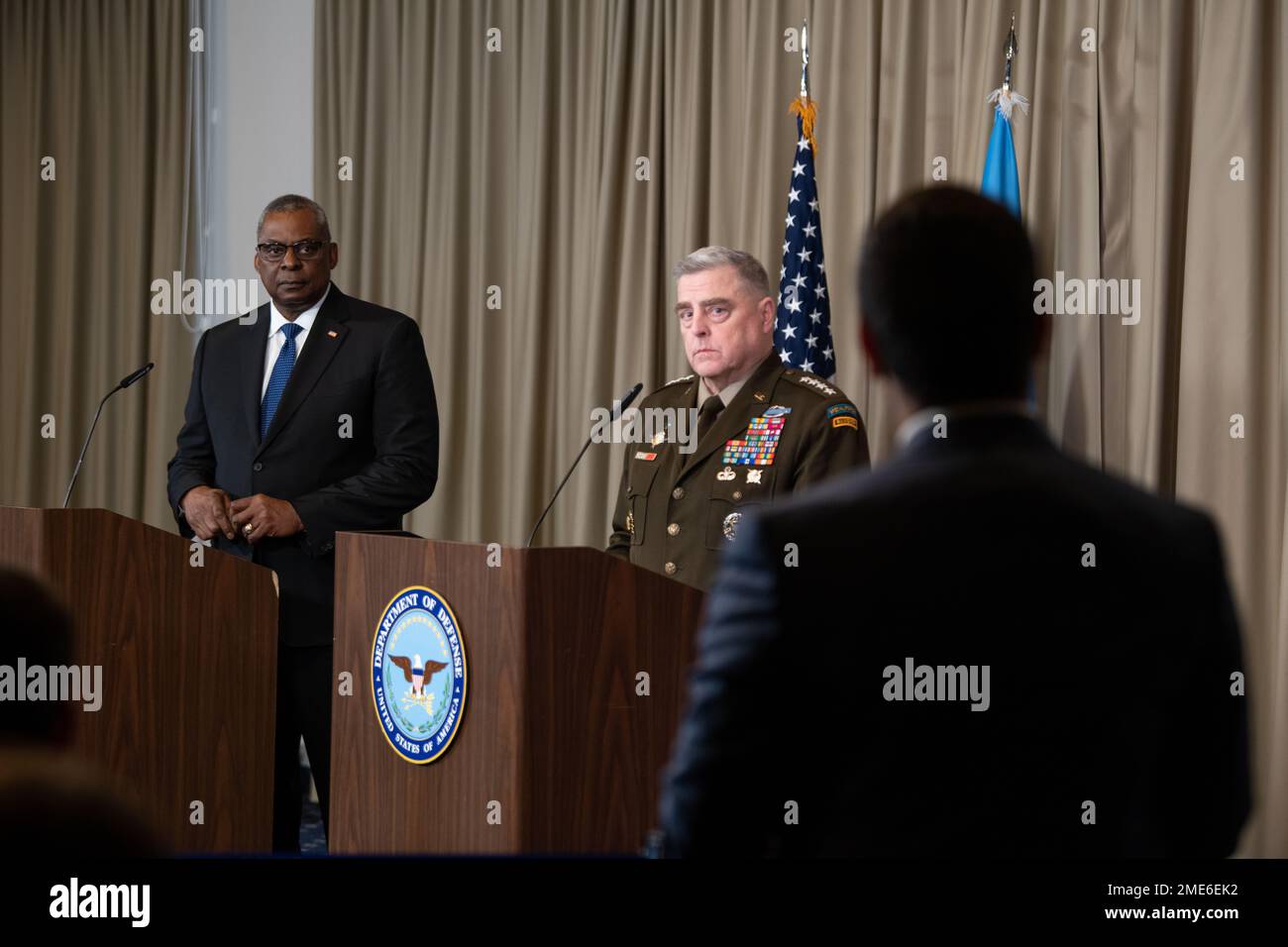 Ramstein-Miesenbach, Germany. 20 January, 2023. U.S. Secretary of Defense Lloyd Austin, and Chairman of the Joint Chiefs Gen. Mark Milley, center, listen to a question following the eighth Ukraine Defense Contact Group meeting at Ramstein Air Base, January 20, 2023 in Ramstein-Miesenbach, Rhineland-Palatinate, Germany. The meeting or 50 nations and organizations decides the best path of providing military support to Ukraine.  Credit: TSgt. Jack Sanders/DOD Photo/Alamy Live News Stock Photo